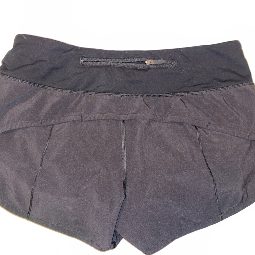 Black lulu running shorts.